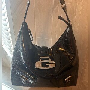 GUESS Vintage Black Patent Shoulder Hobo with Silver-Tone Buckle